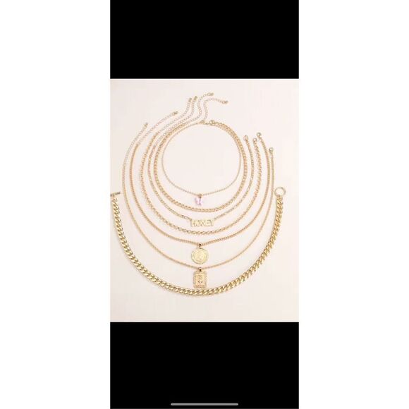 Beautiful seven piece layer necklace, sad adjustable lengths. Have a very well-m - Picture 4 of 9
